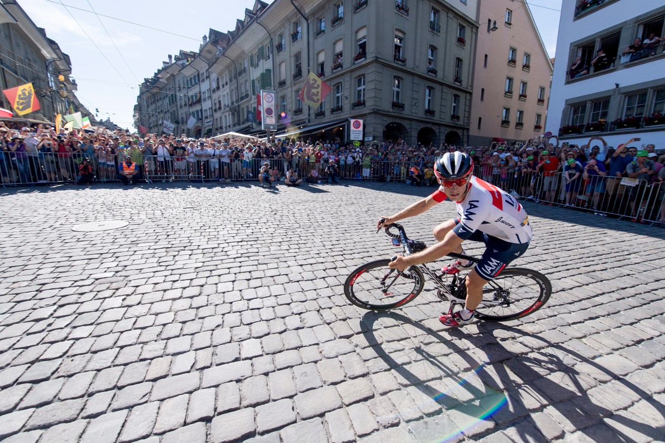 Norwegian Sondre Holst Enger leading the pack at the "Nydeggstalden" hill in the old town of Bern, during the 16th stage of the Tour de France. LUKAS LEHMANN, EPA.