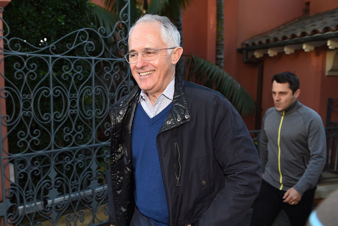 Malcolm Turnbull, along with son Alex, leaves his home in Sydney today. Photo: AAP