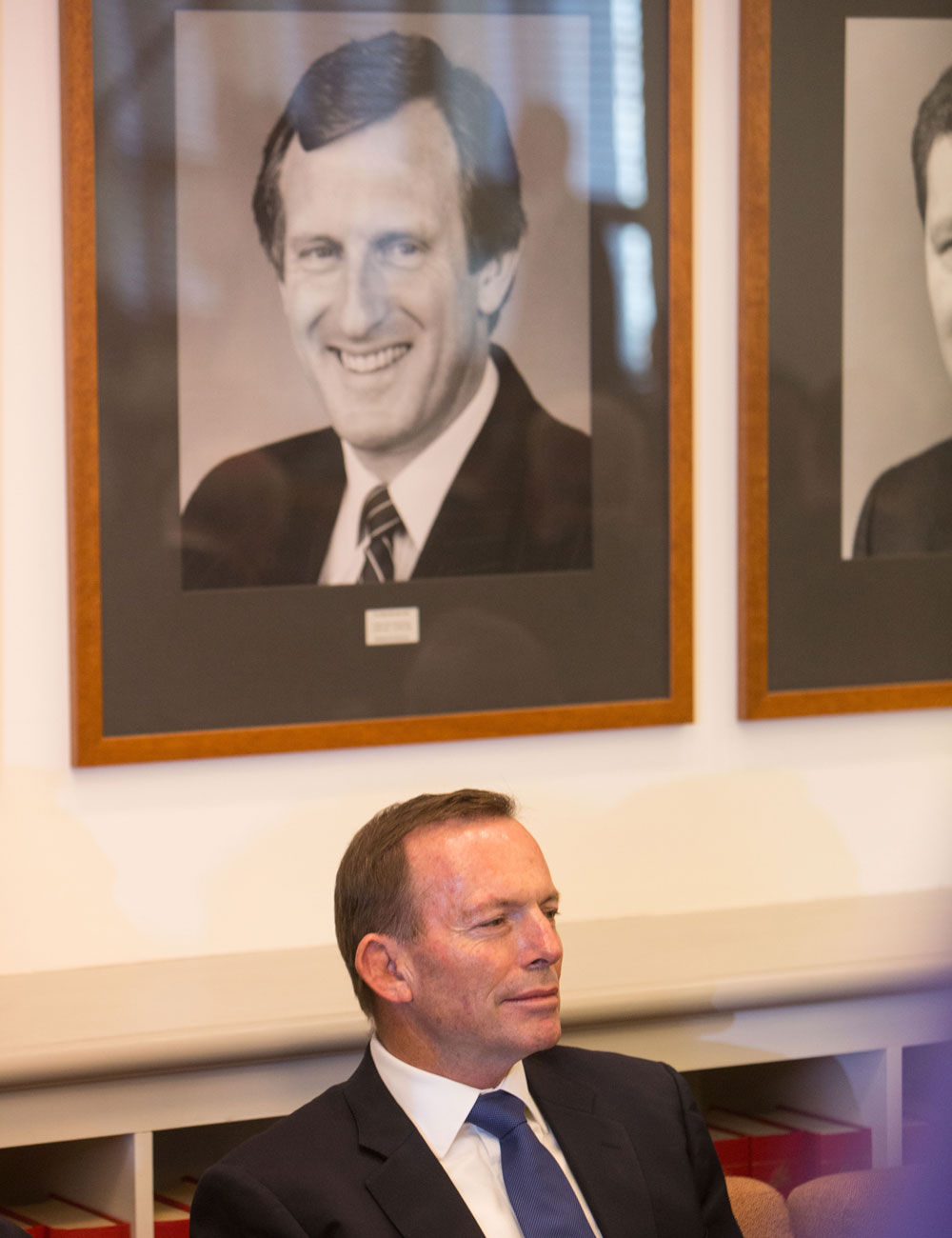 Former PM Tony Abbott at the back of the joint party meeting. Photo: AAP