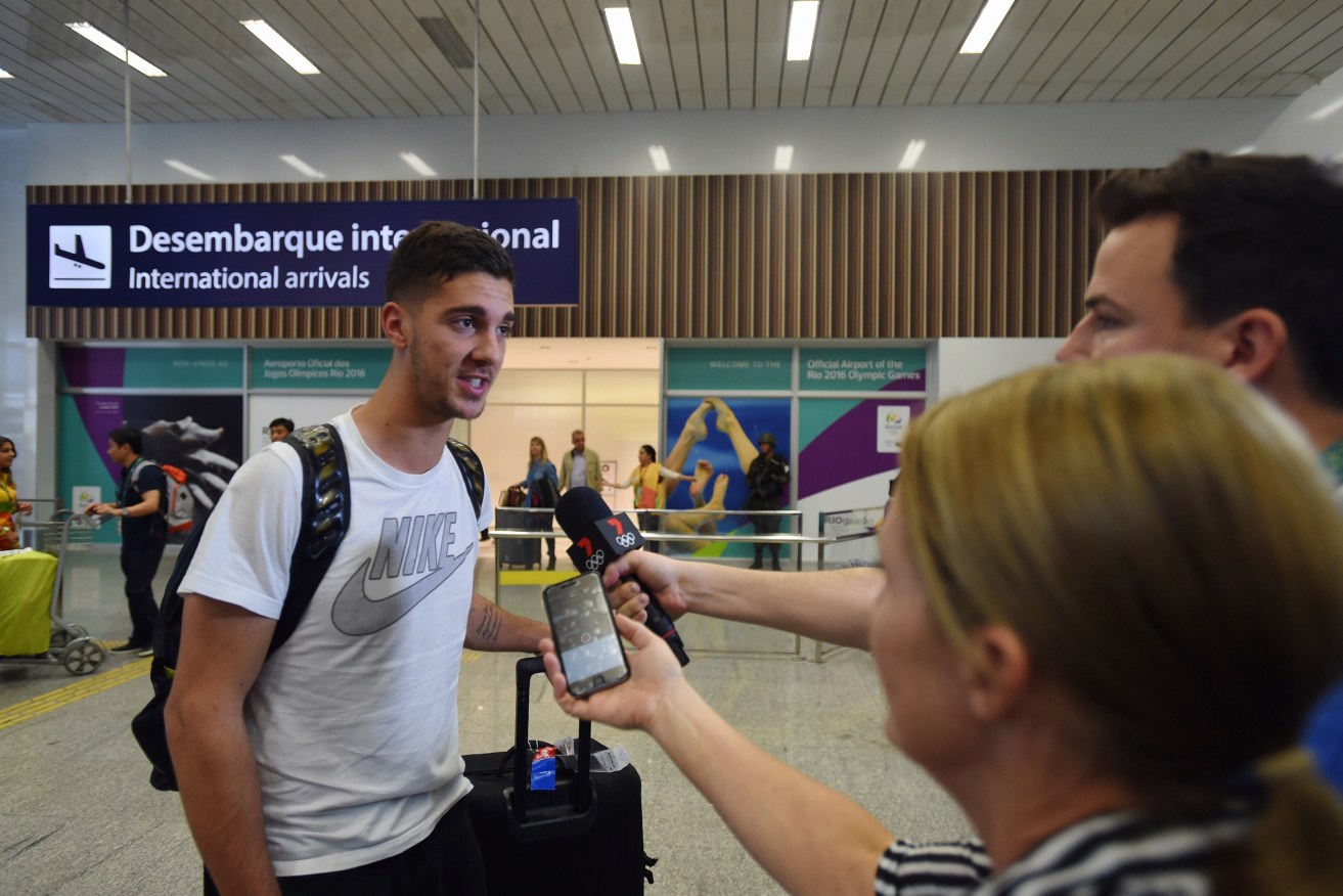 Thanasi Kokkinakis speaks to the media after arriving at Rio Galeao International Airport. Photo: Lukas Coch, AAP.