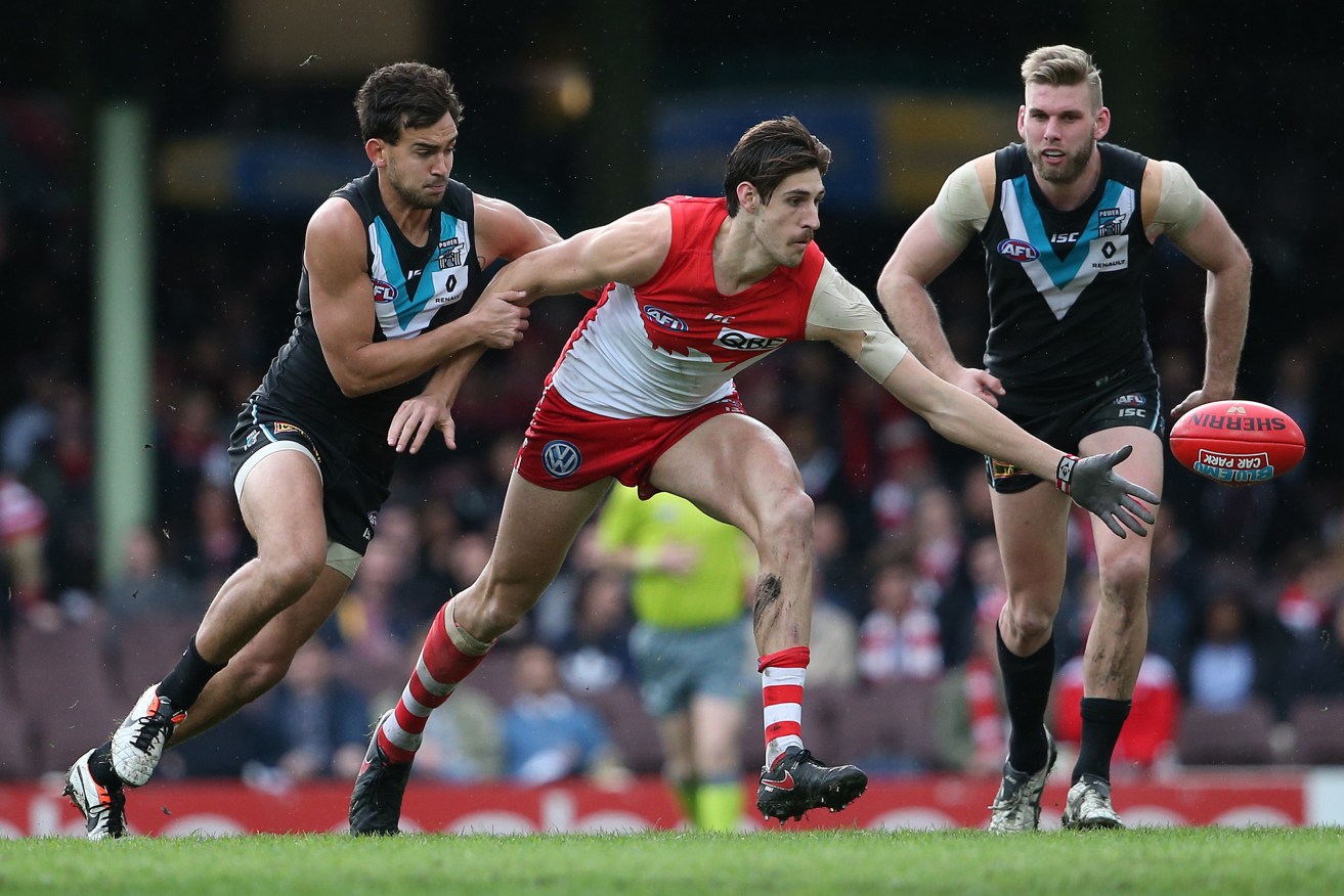 Port lost touch with the top eight after being thrashed by the Swans. Photo: David Moir, AAP.