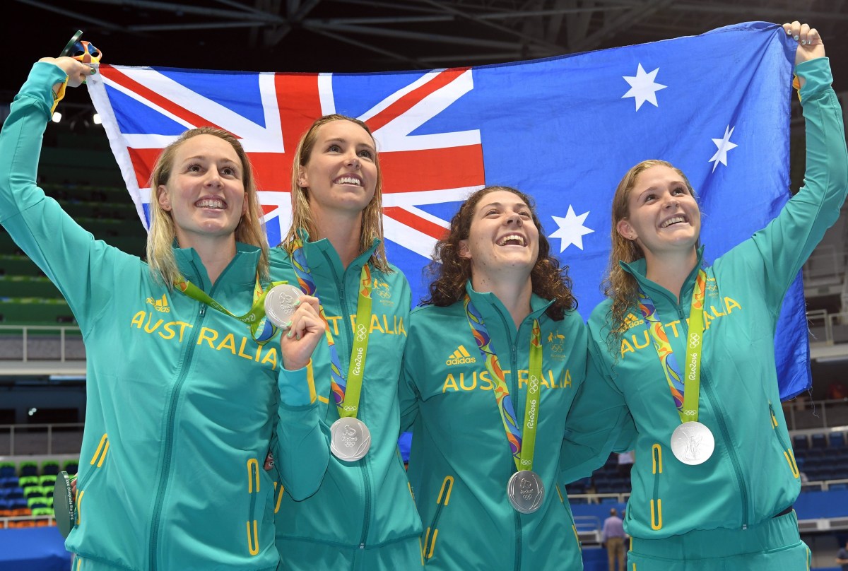 epa05473016 Silver medalists Australia swimmers (L-R) Bronte Barratt, Emma McKeon, Tamsin Cook and Leah Neale pose with their medals after the medal ceremony for the women's 4x200m Freestyle relay Final race of the Rio 2016 Olympic Games Swimming events at Olympic Aquatics Stadium at the Olympic Park in Rio de Janeiro, Brazil, 10 August 2016.  EPA/BERND THISSEN