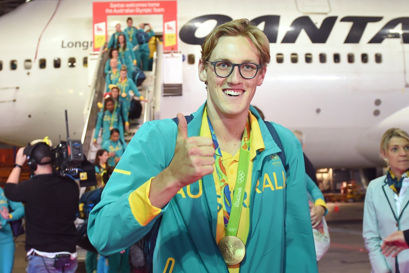 Australian Olympic team gold medalist Mack Horton is welcomed home from Rio de Janeiro. Photo: Paul Miller / AAP