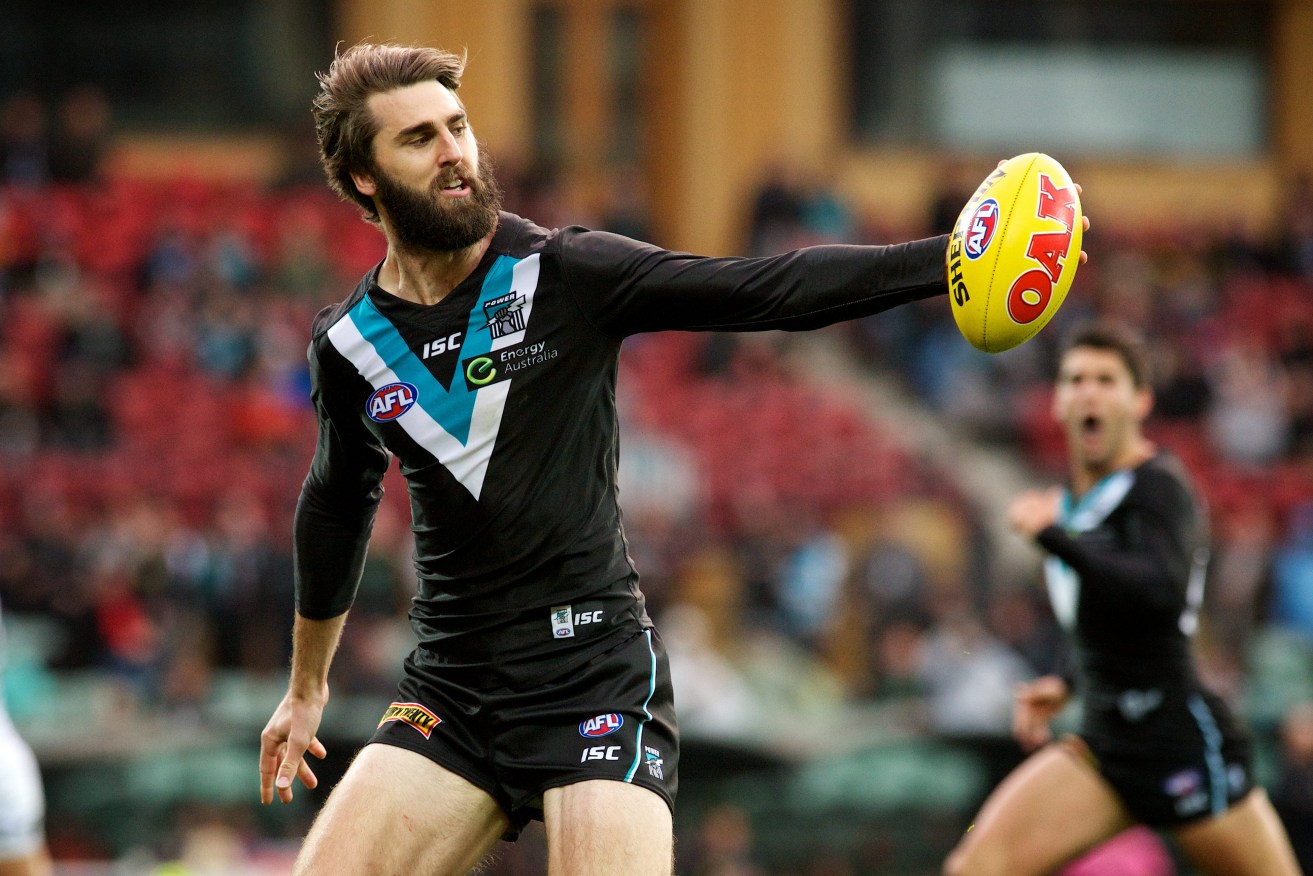 Justin Westhoff gathers at full stretch against GWS. Photo: Michael Errey, InDaily.
