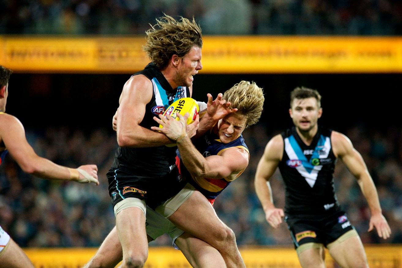 Rory Sloane's bruising battle with Brad Ebert has cost him a week on the sidelines. Photo: Michael Errey / InDaily