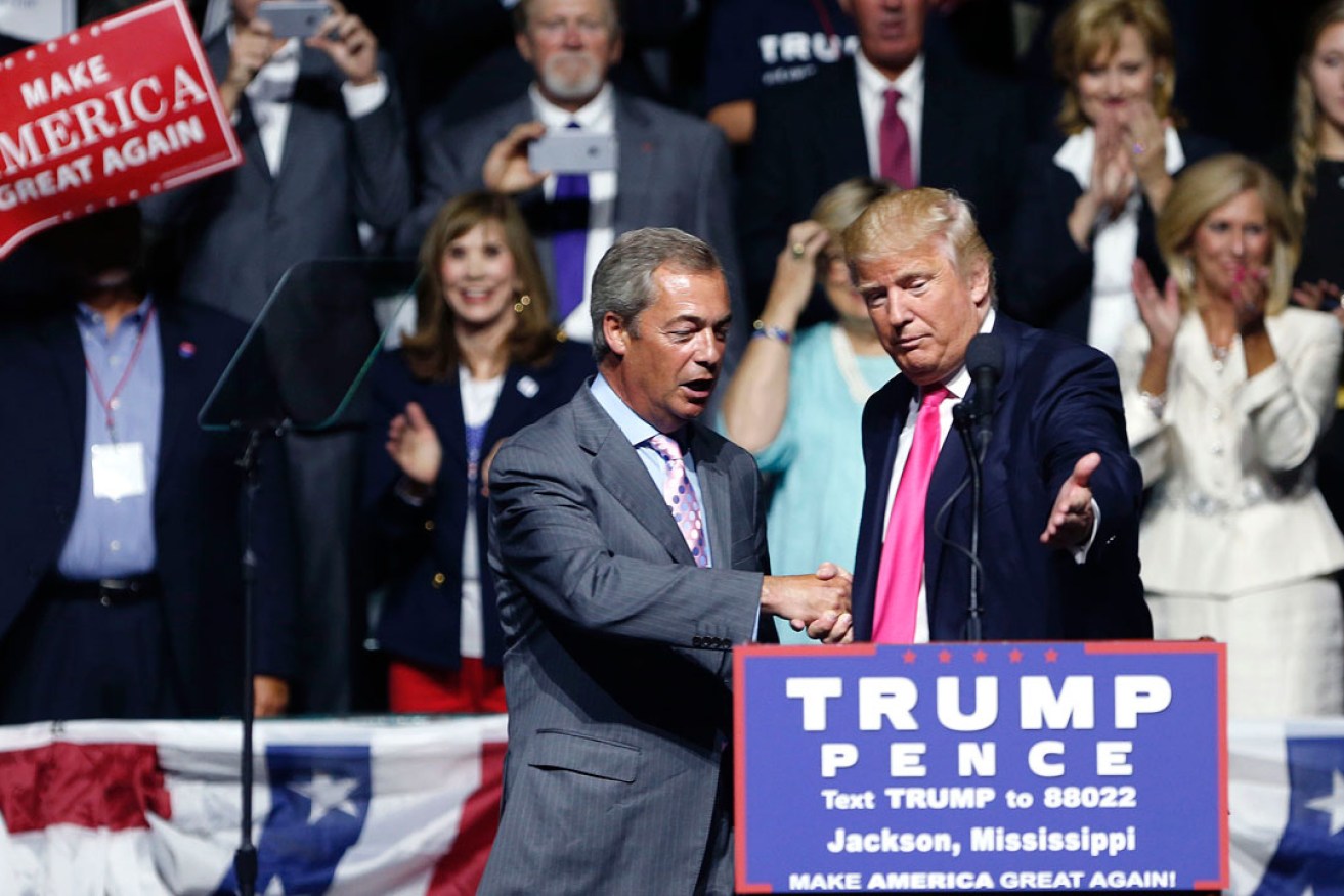 Donald Trump welcomes Nigel Farage to speak at a campaign rally in Mississippi. Photo: AP