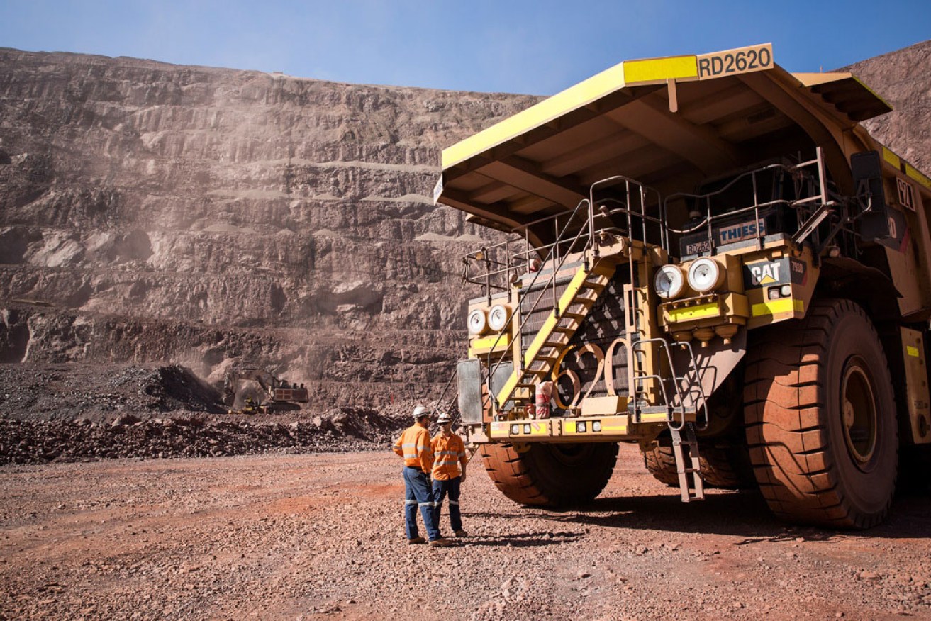 Workers at Oz Minerals' Prominent Hill mine.