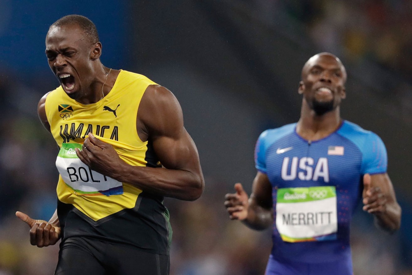 Usain Bolt celebrates winning the gold medal in the men's 200m final at Rio. Photo: AP