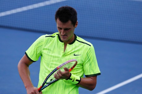 Tomic fined for testy spray