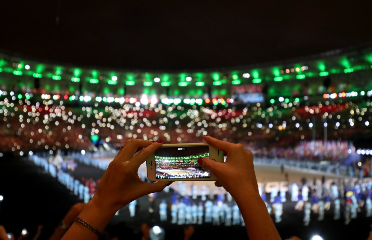 An audience member films video on their iphone during the opening ceremony of the 2016 Rio Paralympic Games at the Maracana, Brazil.. Picture date: Wednesday September 7, 2016. Photo credit should read: Andrew Matthews/PA Wire. EDITORIAL USE ONLY