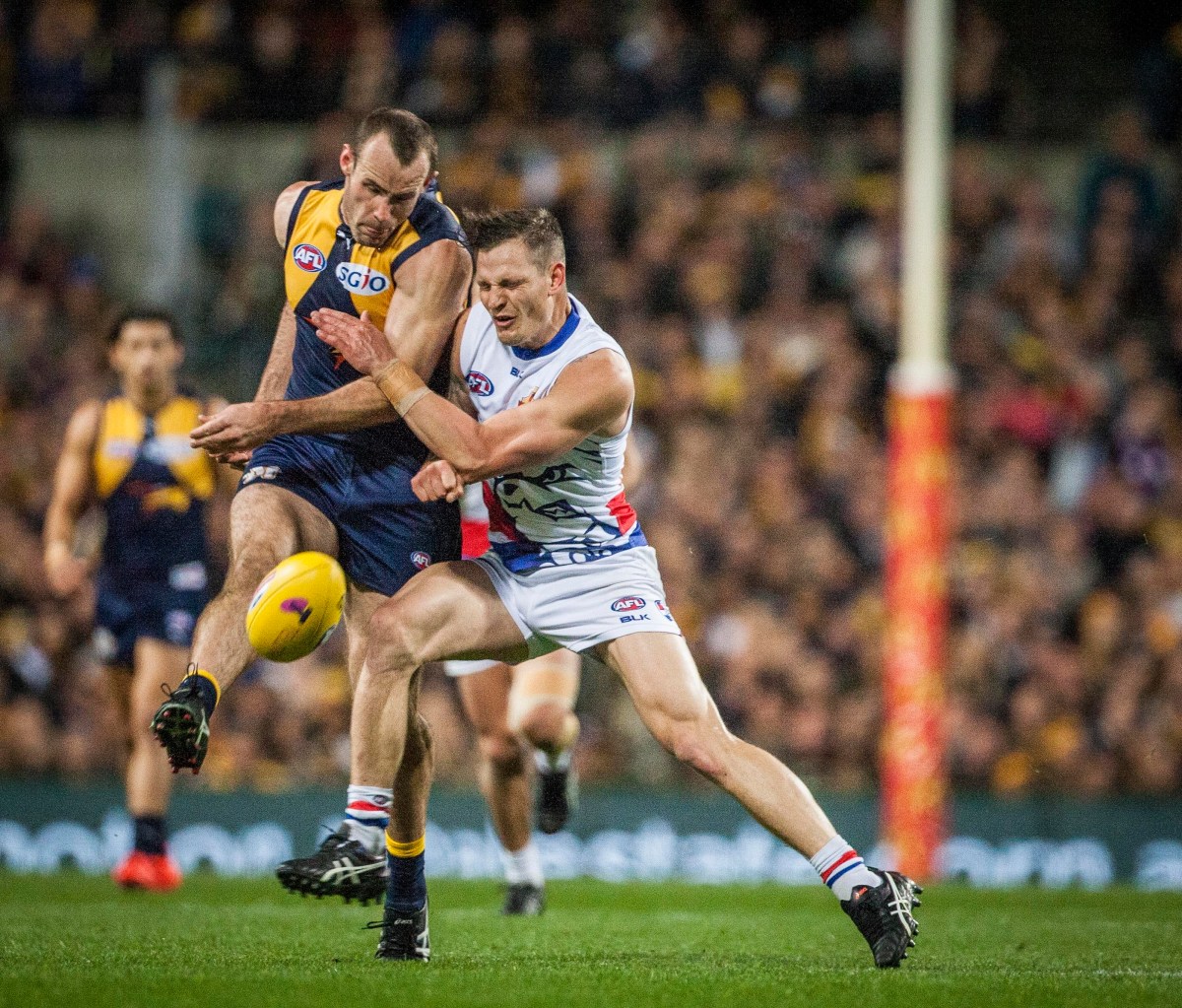 Shannon Hurn of the West Coast Eagles and Clay Smith of the Western Bulldogs  during the AFL Elimination Final between the West Coast Eagles and the Western Bulldogs at Domain Stadium Stadium in Perth, Thursday, Sept. 8, 2016. (AAP Image/Tony McDonough) NO ARCHIVING, EDITORIAL USE ONLY