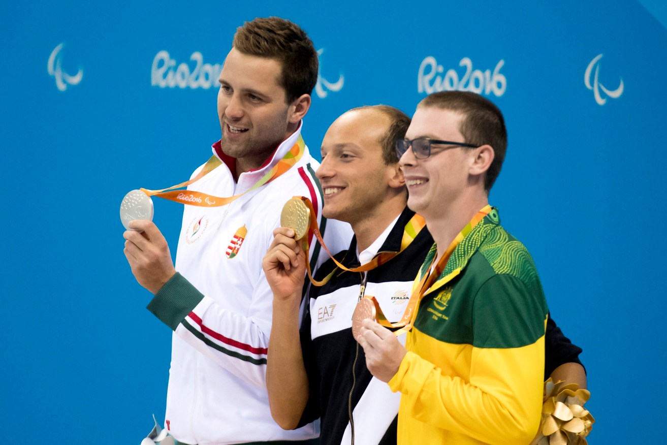 Australia's Timothy Disken has added to his bronze medal in the 20-metre medley S9 final with a gold in the 100 metres. Photo: Szilard Koszticsak / EPA