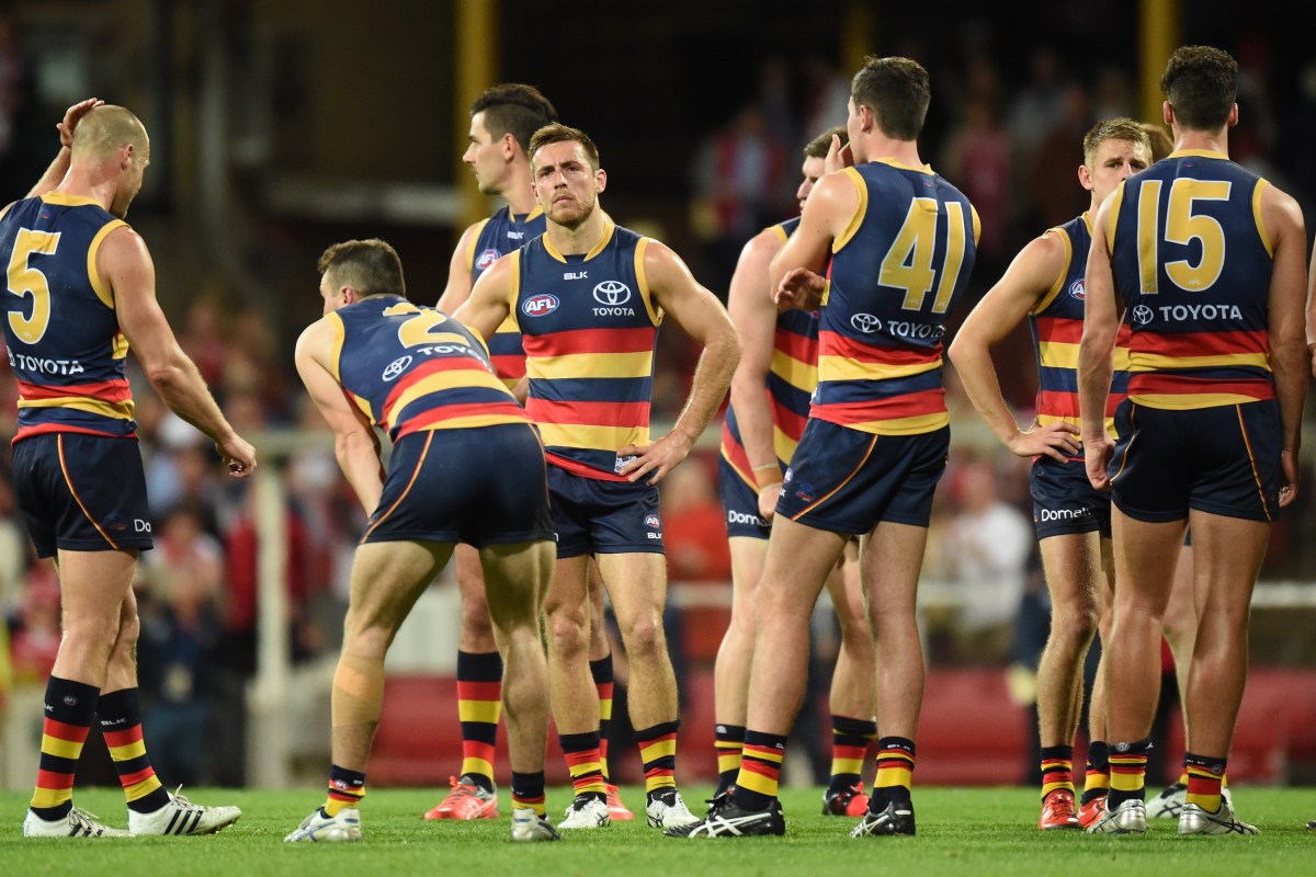 A dejected Adelaide Crows after their loss to the Sydney Swans in the 1st semi-final AFL match at the Sydney Cricket Ground in Sydney, Saturday, Sept. 17, 2016. (AAP Image/Dean Lewins) NO ARCHIVING, EDITORIAL USE ONLY