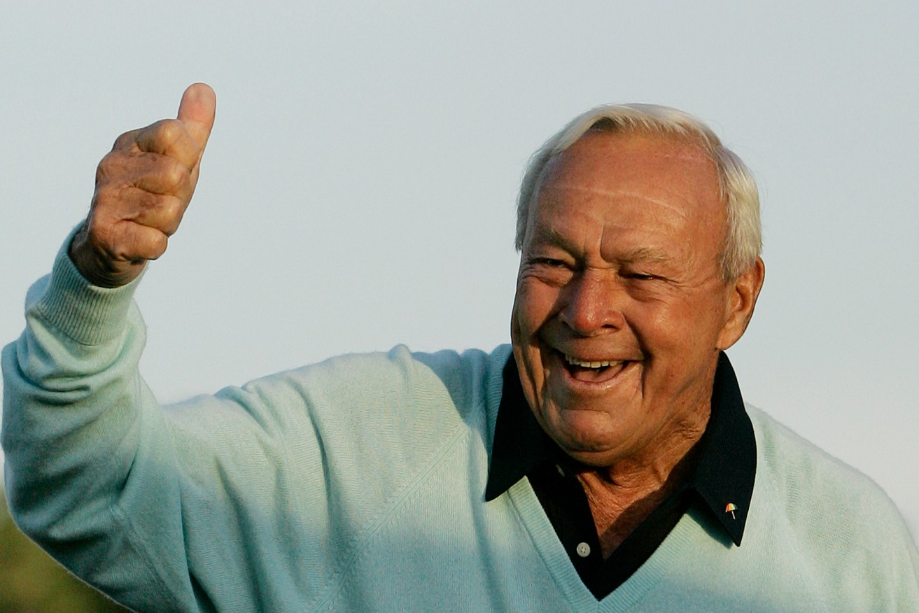 Arnold Palmer acknowledging the crowd after hitting the ceremonial first tee shot before the first round of the 2007 Masters golf tournament at the Augusta National Golf Club. Photo: David J. Phillip / AP