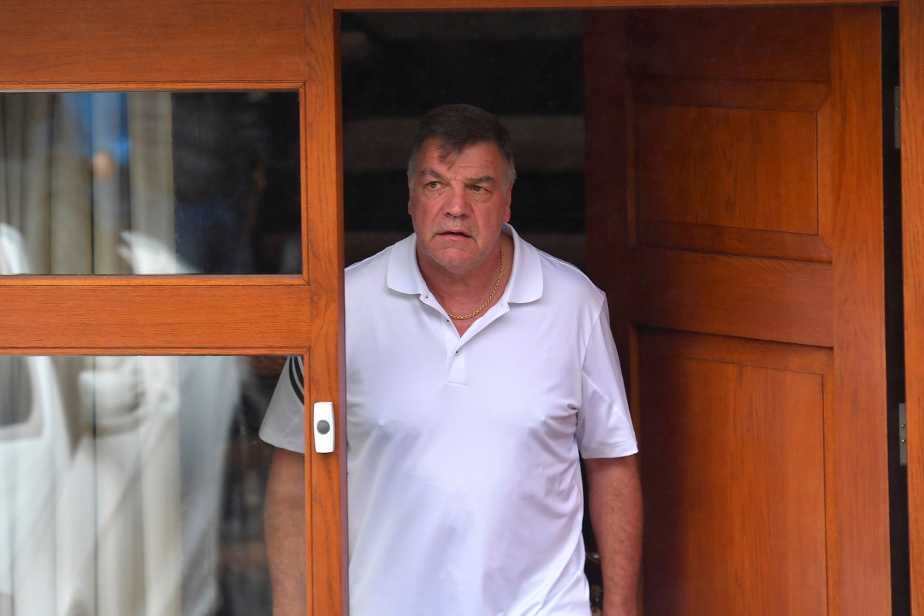 Former England soccer team manager Sam Allardyce leaves his home in Bolton. Photo: Dave Howarth PA via AP