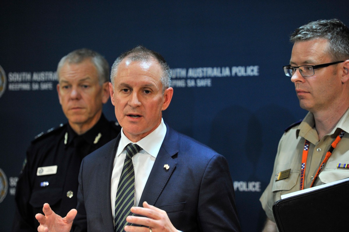 (L-R) Police Commissioner Grant Stevens, SA Premier Jay Weatherill and SA Emergency Chief Chris Beattie speak to the media during a press conference in Adelaide, Wednesday, Sept. 28, 2016. South Australia is coming back to life after severe weather damaged energy infrastructure, shutting down the entire electricity network and plunging the state into darkness. High winds are being blamed for bringing down at least 22 transmission towers in the mid-north on Wednesday with about 80,000 lightning strikes hitting the state, some damaging generation facilities. (AAP Image/David Mariuz) NO ARCHIVING