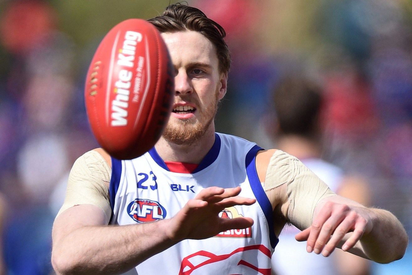 EYES ON THE BALL: Jordan Roughead has passed a medical test to secure a Grand Final berth. Photo: Julian Smith / AAP