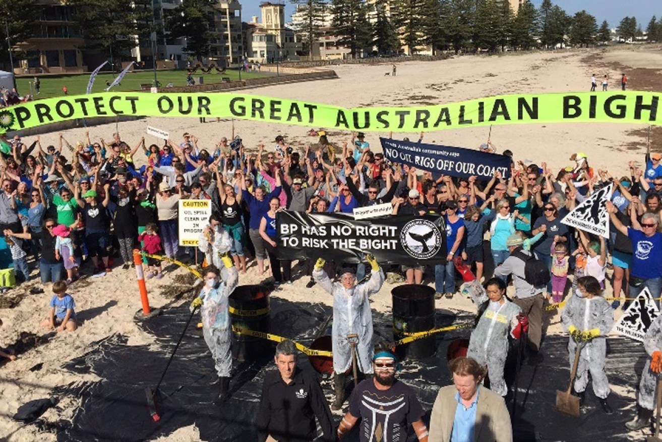 Protesters opposing BP’s plans to drill for oil in the Great Australian Bight gathered on Glenelg Beach in May. Photo: AAP / The Wilderness Society