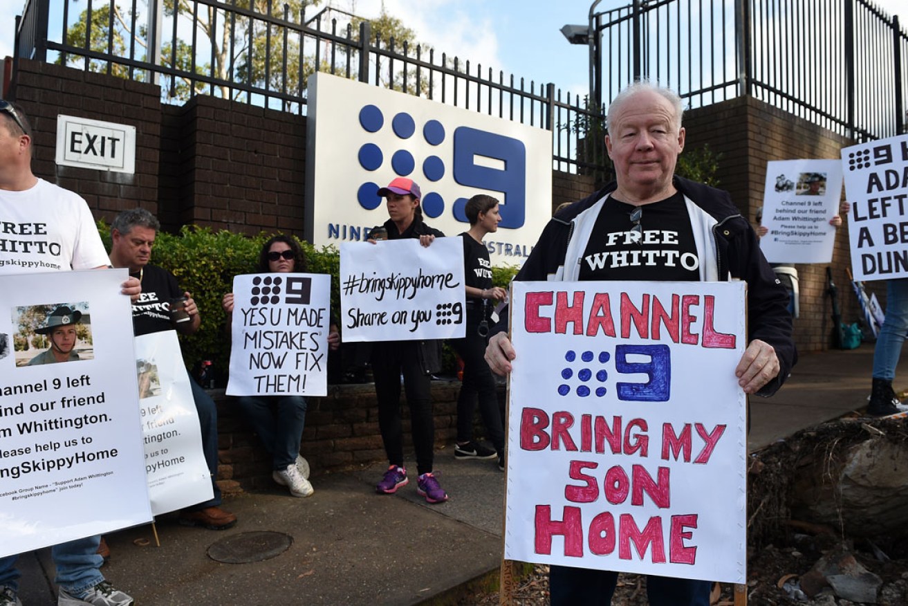 Adam Whittington's father, David, at a protest outside the Channel 9 studios in Sydney before his son was granted bail. Photo: AAP