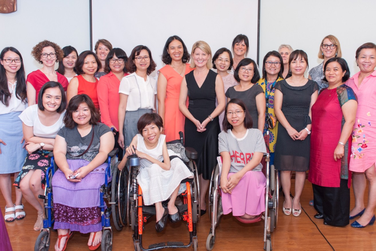 Australia’s Ambassador for Women and Girls, Natasha Stott Despoja, centre, in Hanoi last month after the round-table discussion at Vietnam’s Center for Women and Development.