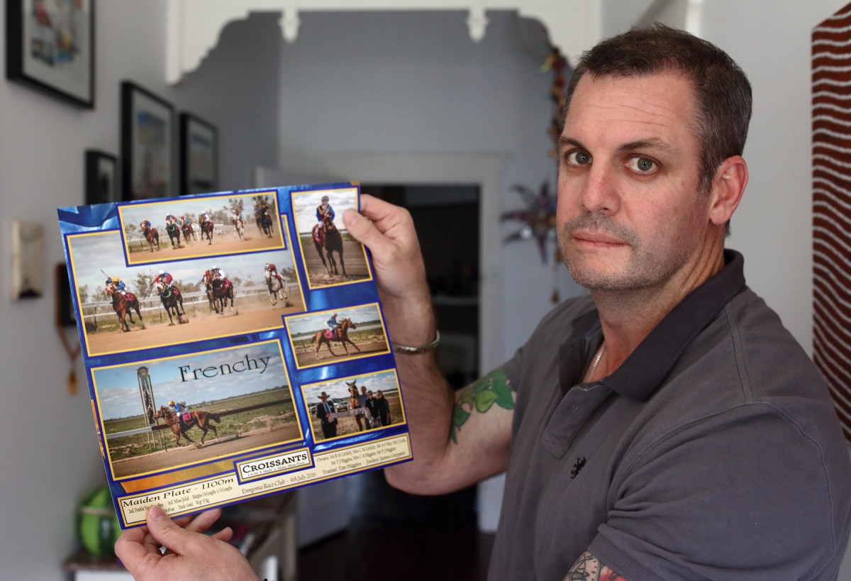 Racehorse owner Bryan Littlely with photos of his horse "Frenchy" which was recently destroyed at a race meeting. Photo: Tony Lewis / InDaily