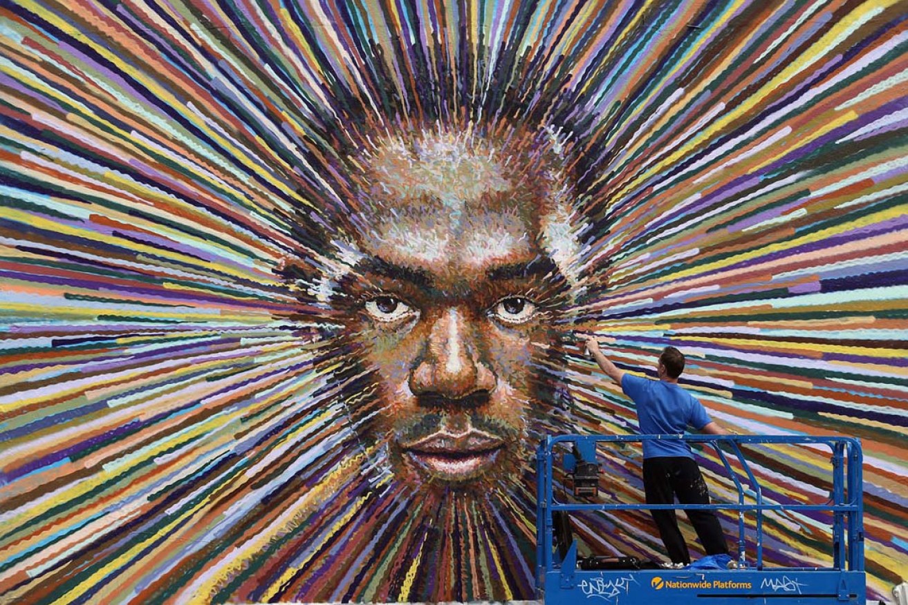Jimmy C painting his portrait of Olympic champion Usain Bolt in London.