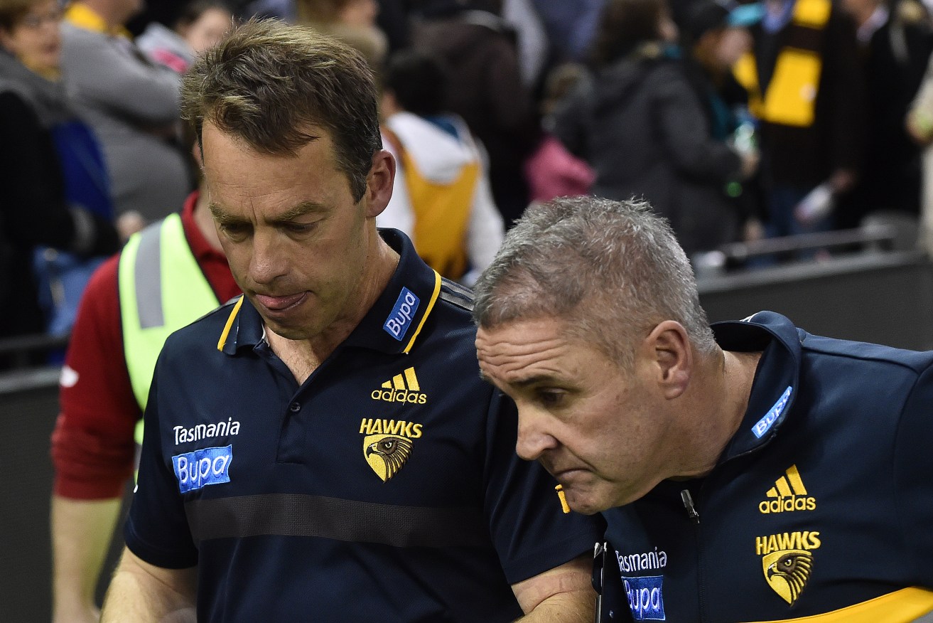It's expected Brisbane will formally unveil Chris Fagan (right, with Hawthorn mentor Alastair Clarkson) as the new Lions coach today.  Photo: Julian Smith / AAP
