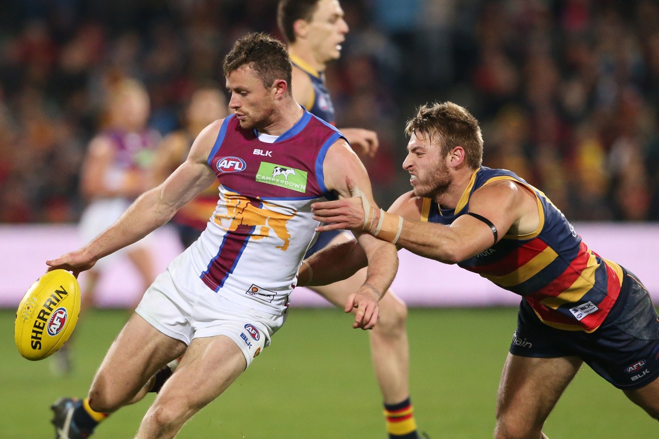 Pearce Hanley will be kicking on with the Suns next season, after a swap of draft picks by Port helped facilitate a trade. Photo: Ben Macmahon / AAP