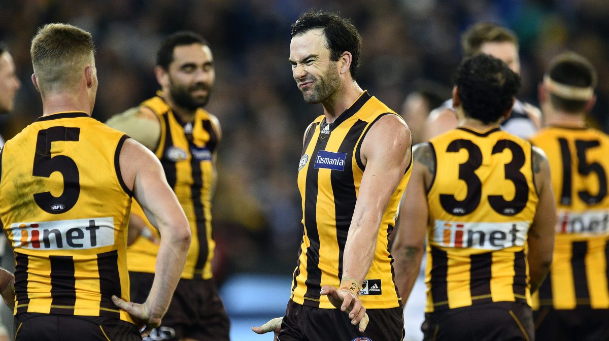 Jordan Lewis looks set to join former teammate Sam Mitchell (left) in flying the Hawks' nest. Photo: Julian Smith / AAP
