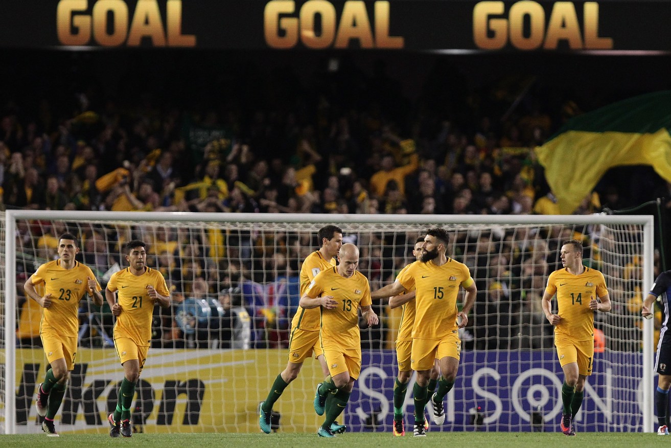 Australia's draw against Japan has left the Socceroos precariously placed. Photo: Stefan Postles / AAP