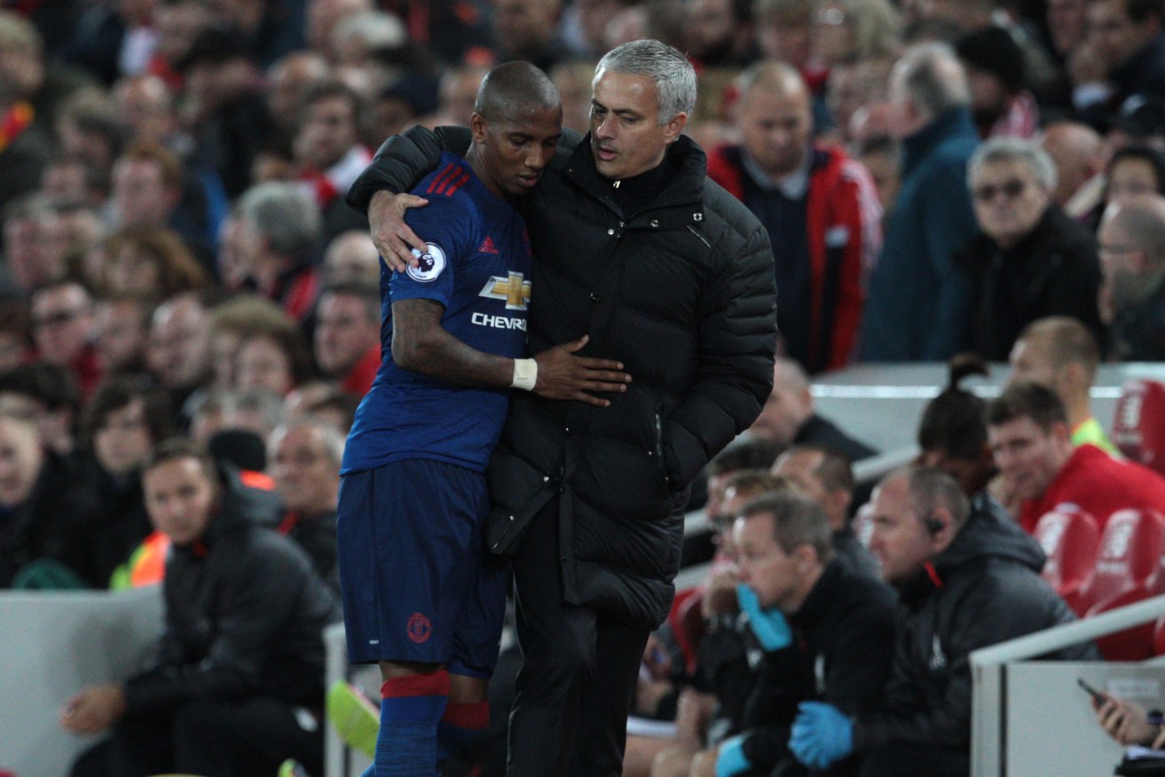 Manchester United manager Jose Mourinho with Ashley Young after the final whistle. Photo: Peter Byrne / PA Wire