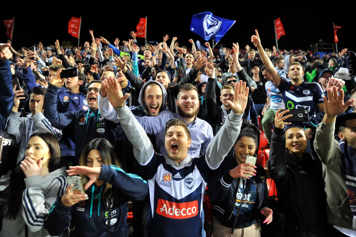 Melbourne Victory supporters during the Round 3 A-League match between Adelaide United and the Melbourne Victory at Cooper Stadium in Adelaide, Saturday, Oct. 22, 2016. (AAP Image/David Mariuz) NO ARCHIVING, EDITORIAL USE ONLY