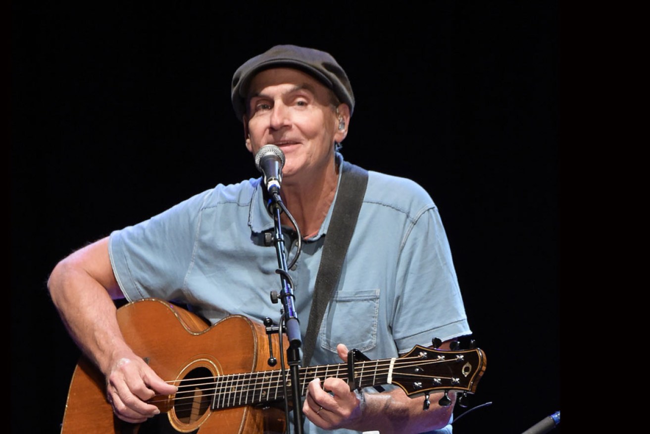 James Taylor performing at a benefit concert in Los Angeles last month. Photo: AAP