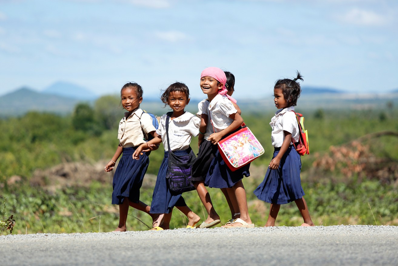 Students arrive at  school at Kampong Speu. Photo: Tony Lewis