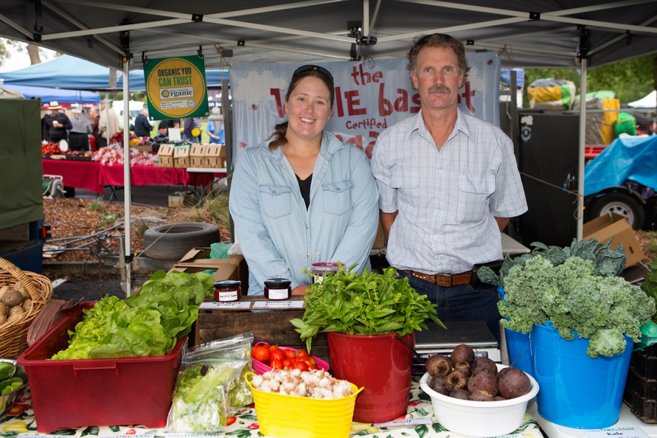 Beetroot producers Emma and Don Baker at their farmers' market stall The Vegie Basket. Photo: Dragan Radocaj
