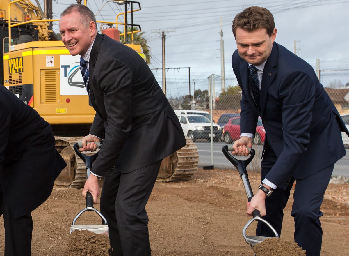Australian Prime Minister Tony Abbott (2nd left) and South Australian Premier Jay Weatherill (2nd right) sod turn as South Australian MP's Jamie Briggs (left) and Stephen Mullighan (right) look on in Croydon, Adelaide, Wednesday, Aug 5, 2105. The Prime Minister was in Adelaide to observe major Federal road funding and sod turn at the South Road expansion project. (AAP Image/Ben Macmahon) NO ARCHIVING