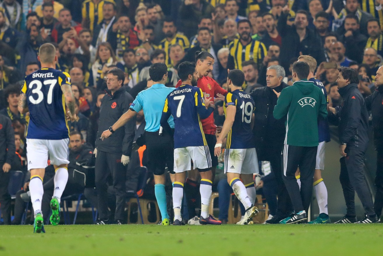 Manchester United's Zlatan Ibrahimovic exchanges words with SK Fenerbahce's Simon Kjaer. Photo via AAP