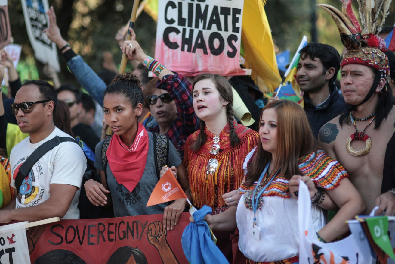 Hundreds urge world leaders to take action to combat climate change, in a march coinciding with the Climate Conference in Marrakech, Morocco. Photo: AP/Mosa'ab Elshamy