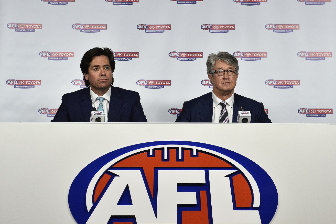 AFL CEO Gill McLachlan and former Commission Chairman Mike Fitzpatrick. Photo: Julian Smith / AAP