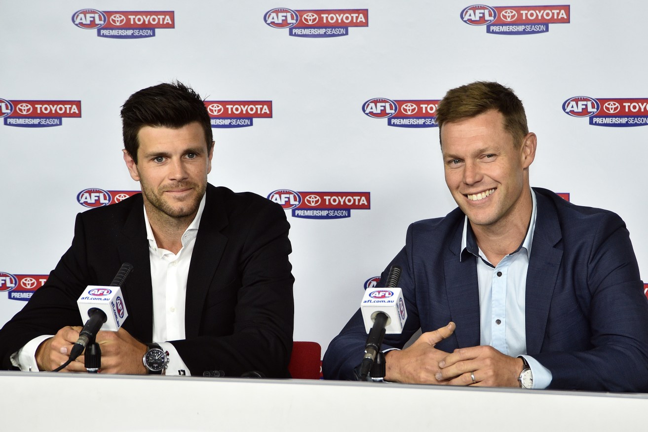 Trent Cotchin and Sam Mitchell addressing the media today. Photo: Julian Smith / AAP