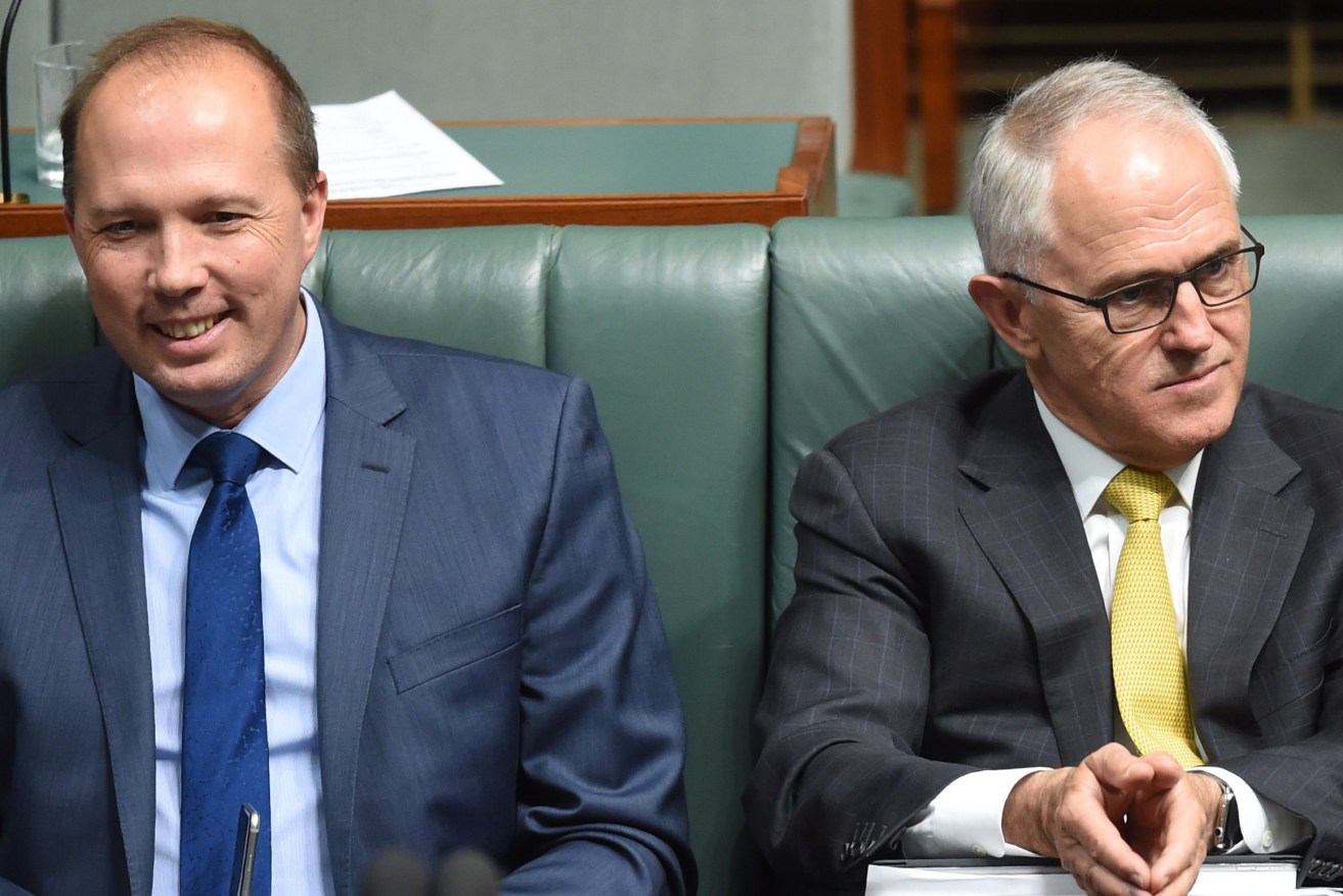 Peter Dutton and Prime Minister Malcolm Turnbull in Question Time. Photo: Lukas Coch / AAP