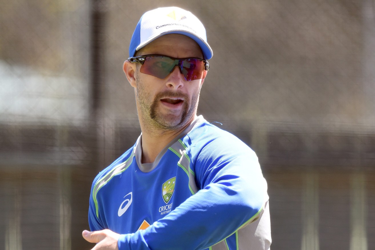 Wicketkeeper Matthew Wade at an Australian team training session at Adelaide Oval yesterday. Photo: Dave Hunt / AAP