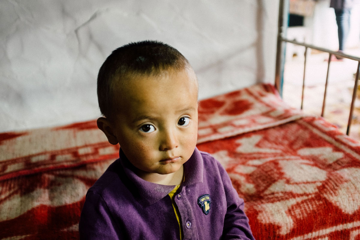 A little boy living on the Russia/Mongolia border. Photo: Ashton Papazahariakis