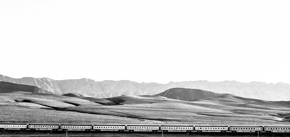 A train crosses the desolate landscape of Turkmenistan, a country insulated from the world under three decades of oppressive rule. Photo: Ashton Papazahariakis