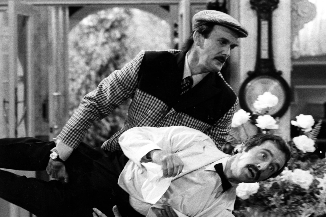 "He's from Barcelona": John Cleese as Basil Fawlty carries Manuel, played by Andrew Sachs.
