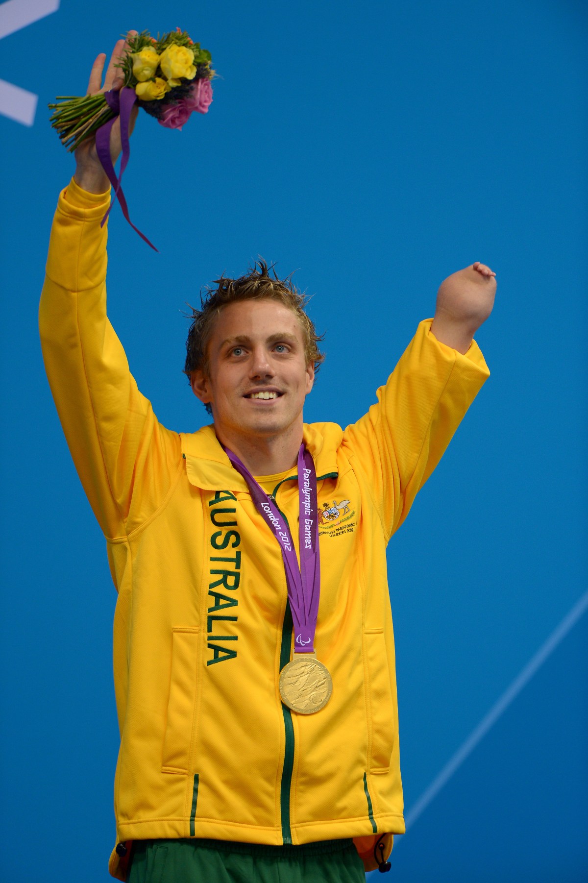 Supplied photo made available Saturday, Sept. 8, 2012, of swimmer Matthew Cowdrey from Australia celebrating his gold medal win in the Men's 400m Free S9 event at the Paralympic Games in London on Friday, Sept. 7, 2012. (AAP Image/Australian Paralympic Committee, Jeff Crow) NO ARCHIVING, EDITORIAL USE ONLY