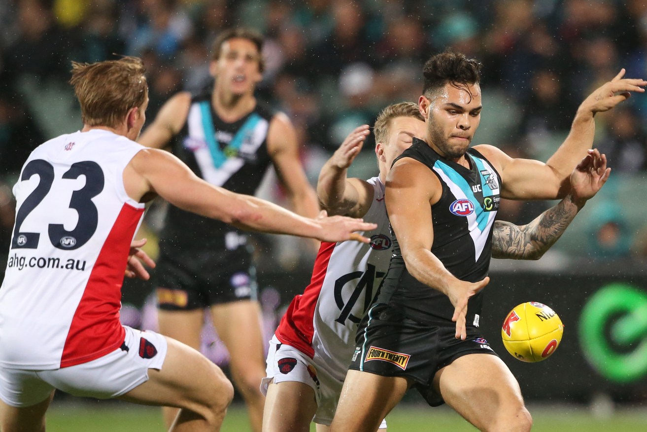 Jarman Impey has been fined and banned for one game by Port Adelaide. Photo: Ben Macmahon / AAP
