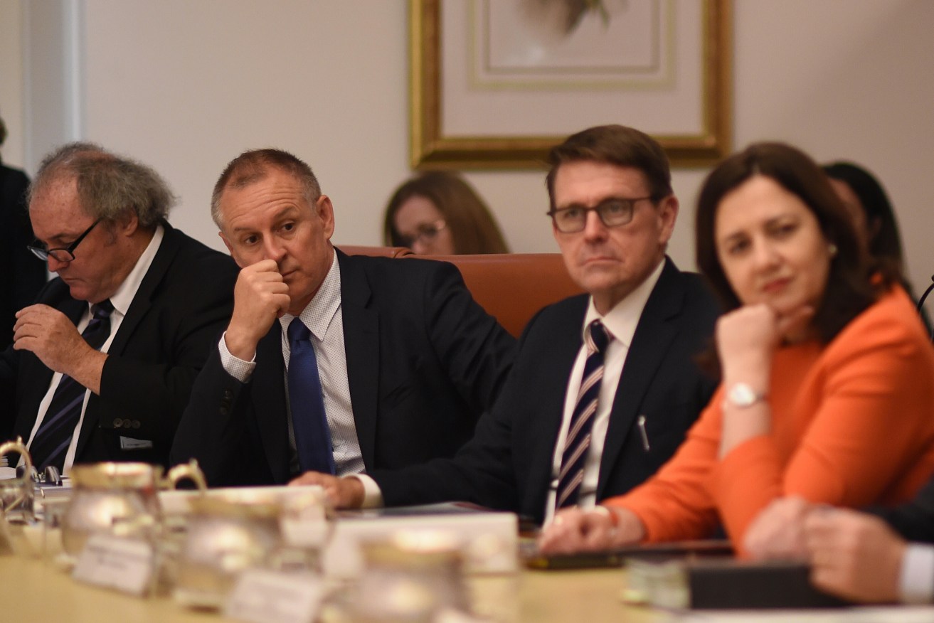 South Australian Premier Jay Weatherill (second left) listens to Prime Minister Malcolm Turnbull during the COAG meeting today. Photo: Lukas Coch/AAP