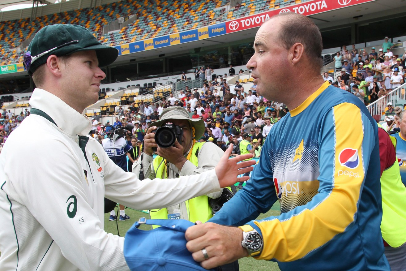 Steve Smith shakes hands with Pakistan's coach - and former Australian mentor - Mickey Arthur after Australia's victory in Brisbane. Photo: Tertius Pickard / AP