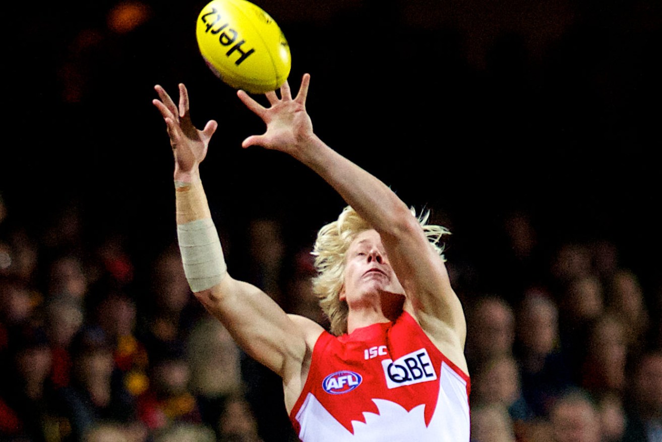 Heeney takes a hanger against the Crows. Photo: Michael Errey / InDaily